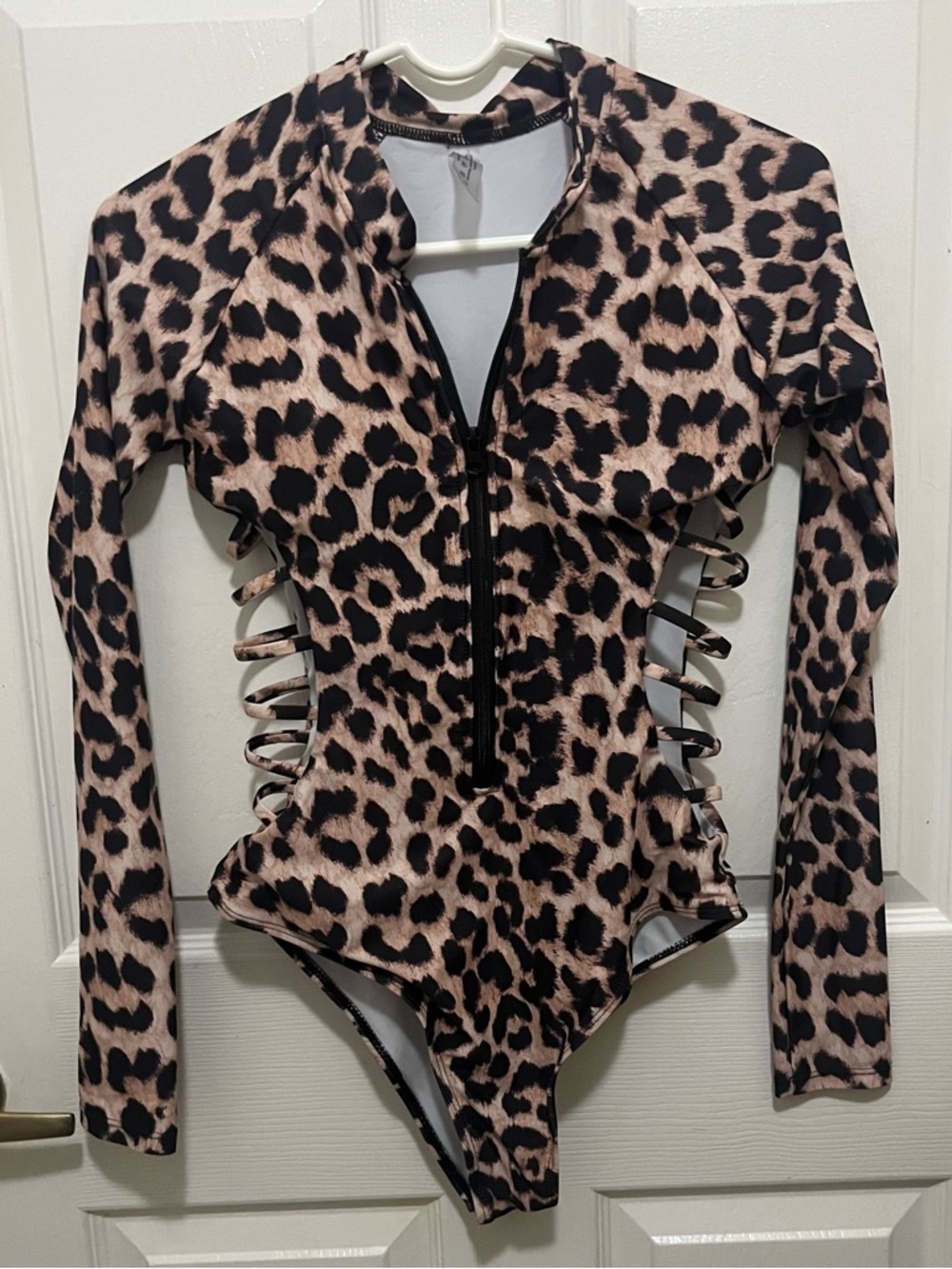 Cache Leopard Print Long Sleeve One-Piece Swimsuit in Tan and Black